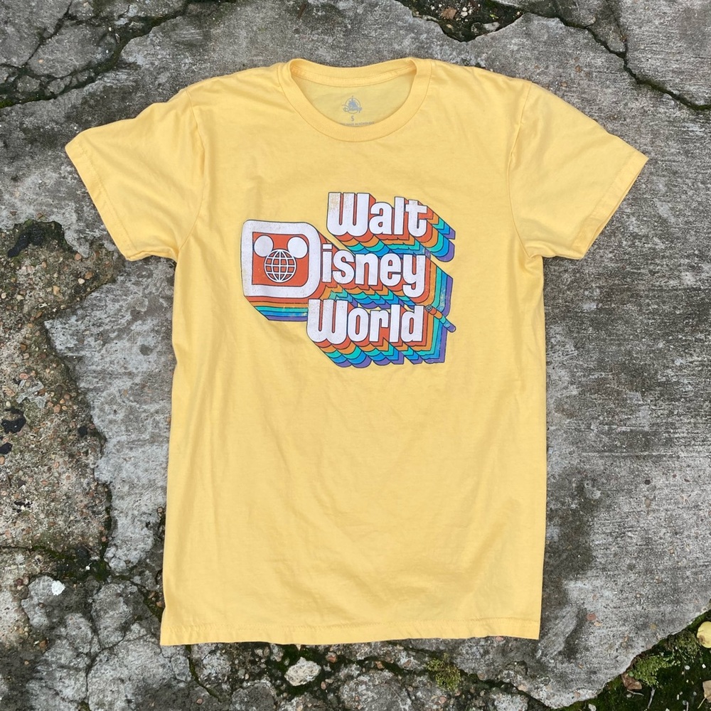 Walt Disney world yellow cream t shirt.